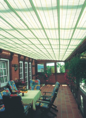 Markilux Roof Festoon blind installed in a long conserv