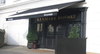 Hotel with retractable awning