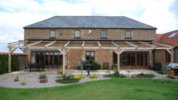 Markilux Awning installed on wood structure in Lincoln - closed