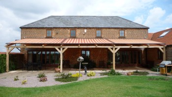 Markilux Awning installed on wood structure in Lincoln - open