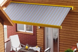 weinor semina patio awning in grey on brick and timber wall