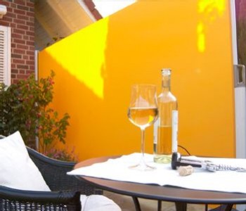 Markilux-790-yellow-dining-patio Markilux-790-yellow-dining-patio