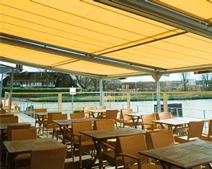 Markilux RS-8000 supporting a Markilux 8000 awning in a commercial dining area.