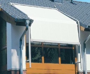 Markilux 8000 Curved Awning on an exterior wooden conservatory