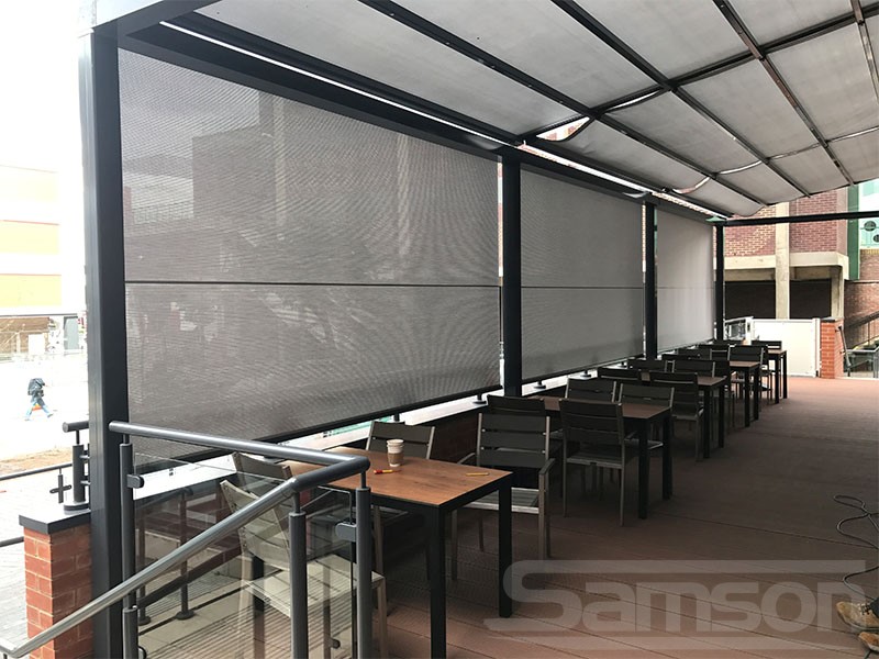 Seating Area Extension with a Retractable Roof System Installation