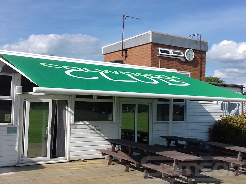 Branded Retractable Awnings in Commercial Setting