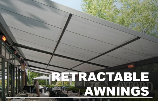 commercial retractable fabric awnings