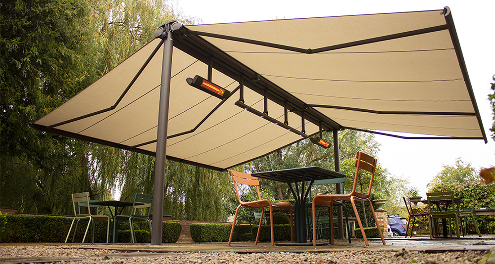 Cream Butterfly Awning Installation for Pub Garden