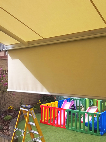 Awning with drop-down valance