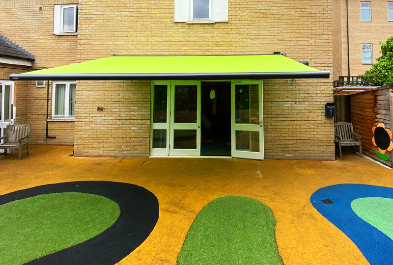 Bright green awning for outside nursery space
