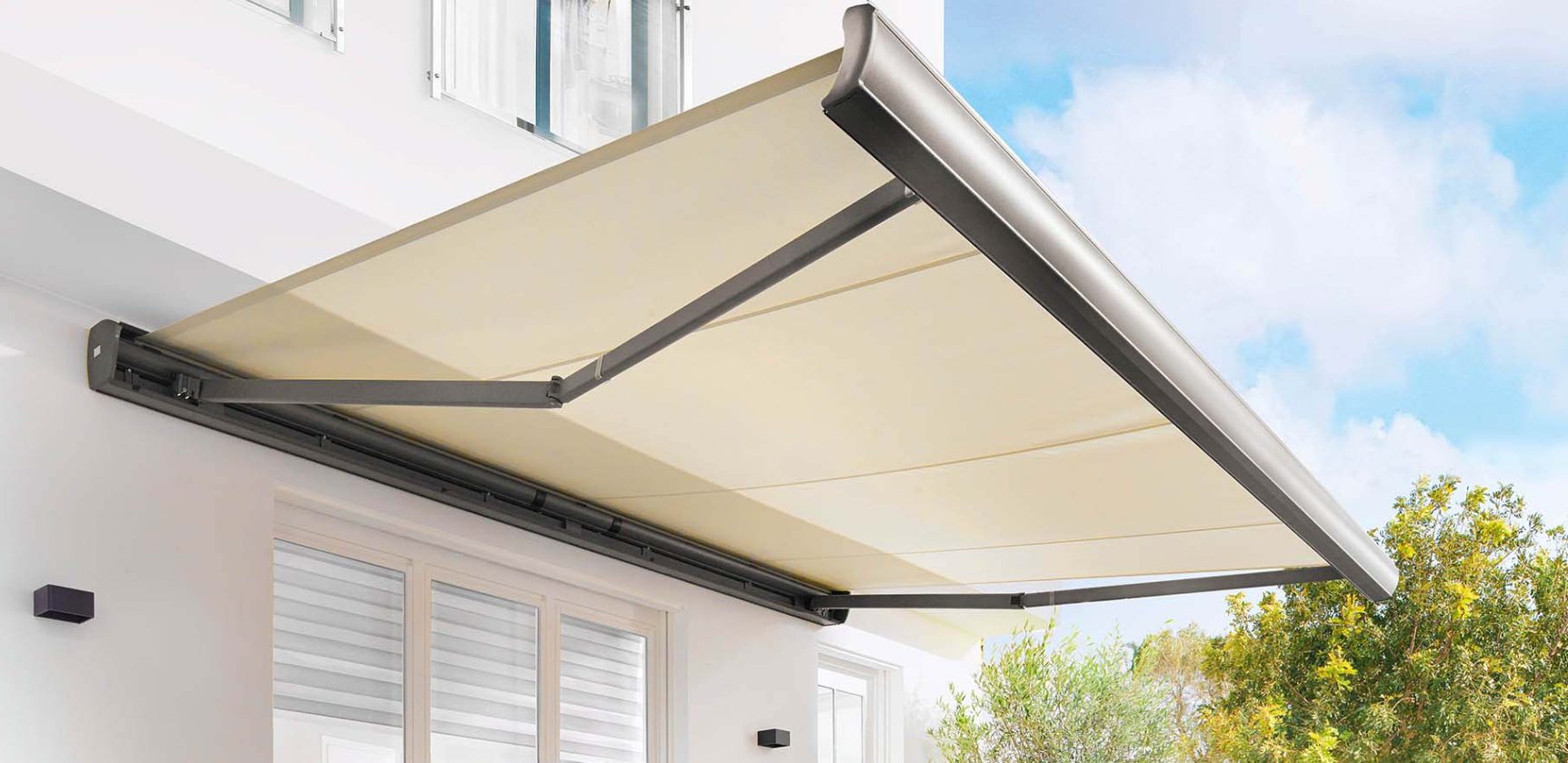 Markilux MX-3 awning in beige installed on a patio