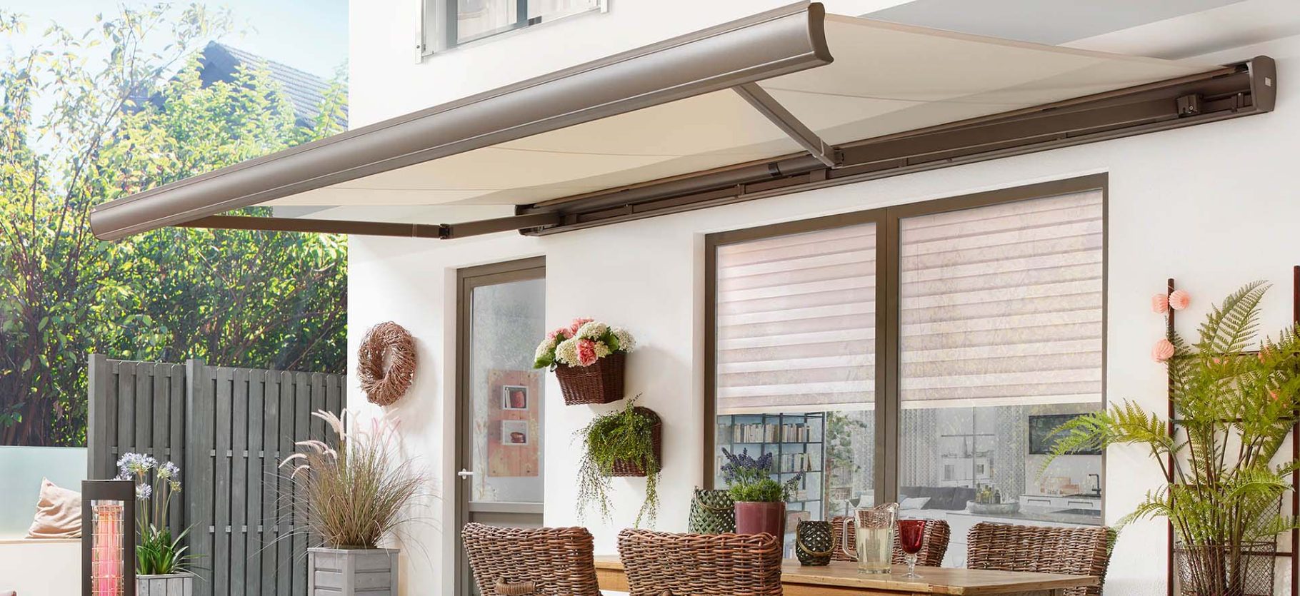 Markilux MX-3 awning in beige installed on a patio