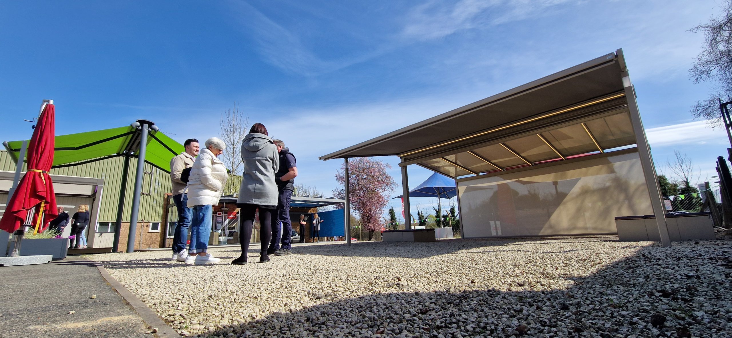 White Markilux MX-3 awning installed on a modern patio